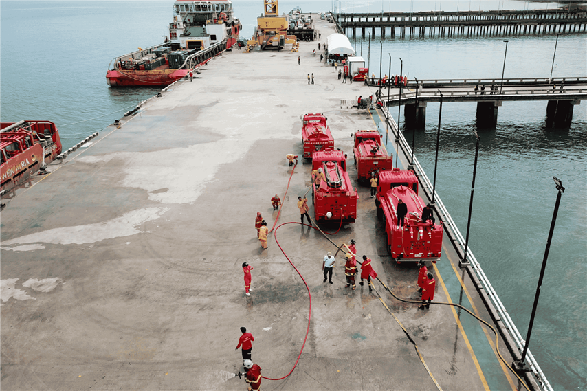 Fire Safety Drill At Port In Thailand With Fire Engines And Hoses Web