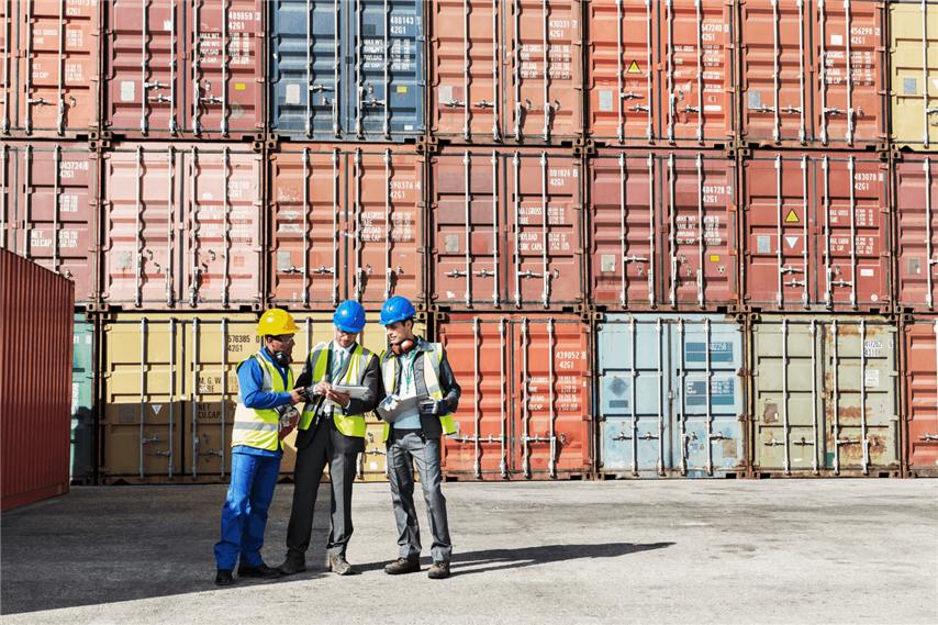 Worker And Businessmen Talking Near Cargo Containers Web